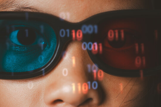 Extreme close up of 3D glasses with glowing orange binary code numbers