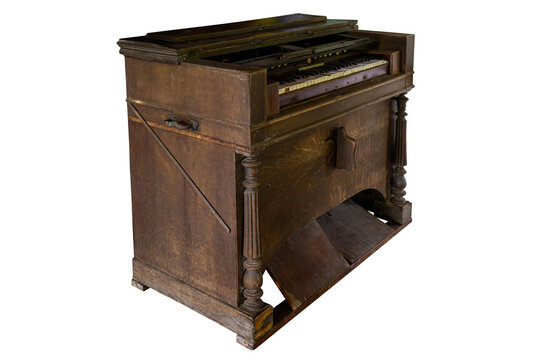 The old, antique piano was dirty and scratched