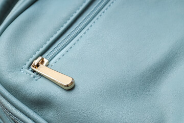Fashion and luxury accessories close up of a blue leather handbag with a gold zipper detail for retail style and high quality craftsmanship concepts © Pixel-Shot