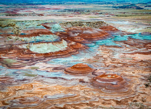 Aerial view reveals colorful Bentonite Hills badlands at dawn Utah