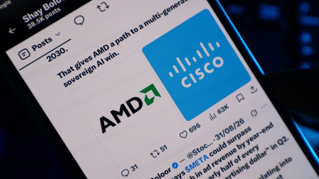 AMD and Cisco technology corporate logos on smartphone screen discussing hardware integrations and AI infrastructure. Kolkata, West Bengal, India, September 11, 2026