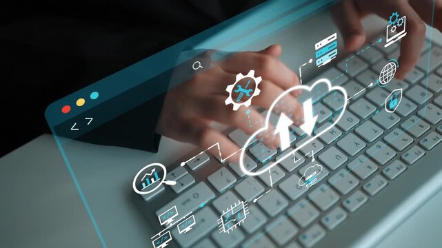 Hands Typing on a Keyboard with Digital Cloud and Technology Icons Representing Data Management and Information Technology Concept in a Modern Office Environment. Entropy.