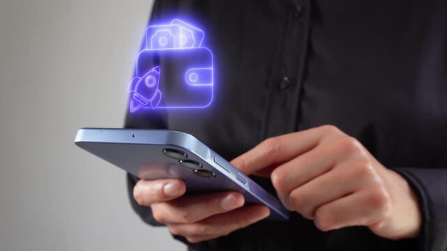 Successful entrepreneurship. Professional businesswoman checking her mobile phone, featuring a virtual icon of a wallet with a rocket.