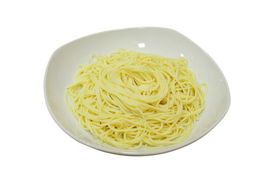 Boiled yellow spaghetti noodles served on white plate isolated on transparent background