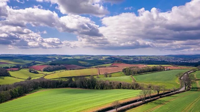 Fields and Farms in hyperlapse from a drone, Devon, England, United Kingdom
