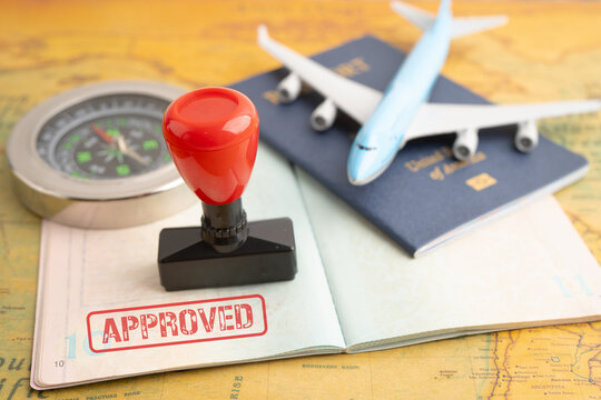 Passport with approved stamp on document for tourism to immigration at airport in country.
