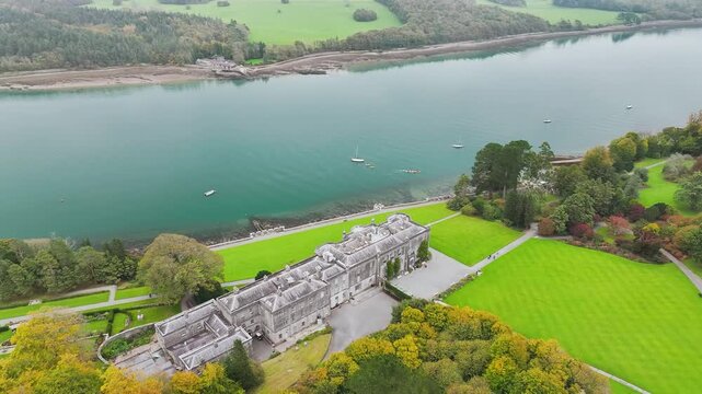 Autumn over Plas Newydd House from a drone, Gardens and Parkland, Llanfairpwllgwyngyll, Anglesey, Wales, UK