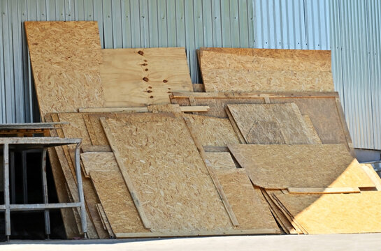 Stack of old oriented strand board (OSB) panels