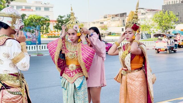 Thai Khon Dancers Adjusting Traditional Costumes and Masks in Bangkok