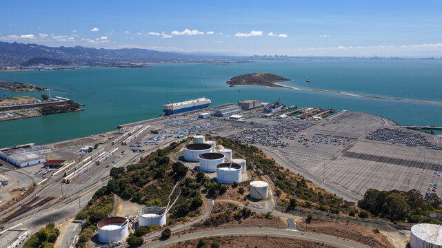 Port of Richmond oil tanks and cargo ship in San Francisco Bay
