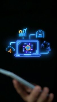 Businessman holding smartphone vertical shot beside glowing laptop controlling smart factory automation network. Industrial IoT robotics, warehouse supply chain logistics, and engineering concept.