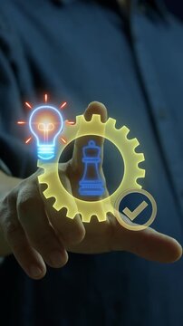 Businessman finger touching glowing gear vertical shot with chess king piece, lightbulb, and checkmark. Strategic corporate leadership execution, verified innovation, and solution system concept.