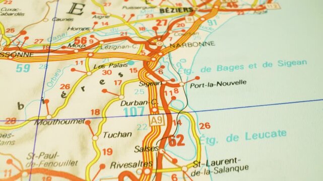 Perpignan to B&eacute;ziers, France &ndash; geographic road route over an atlas map, gliding view