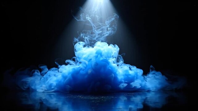 Mysterious blue spotlight illuminates a billowing cloud of smoke against a textured concrete wall photograph.