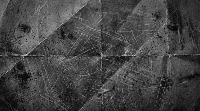 Vintage dark paper texture with geometric fold lines, heavy scratches, distressed grunge surface overlay for cinematic photo editing, dark moody backdrop, creative album art.