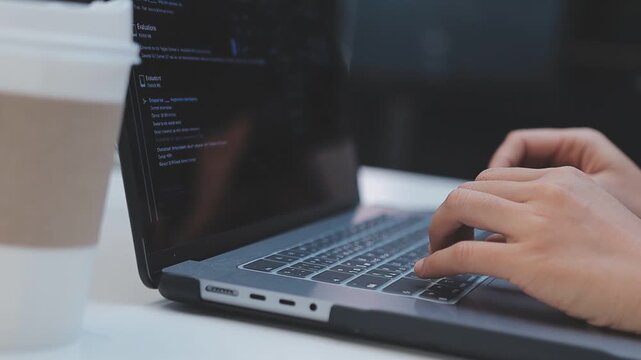 Asian happy woman and man programmer team coding software at computer in dark tech office, Concept of digital transformation, modern cyber security, startup teamwork and future IT digital network