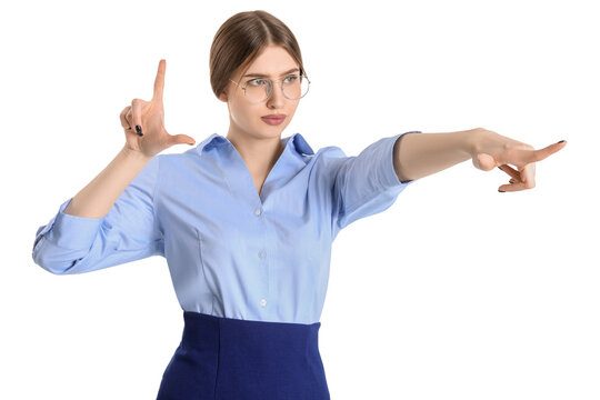 Young businesswoman showing loser gesture and pointing at something on white background