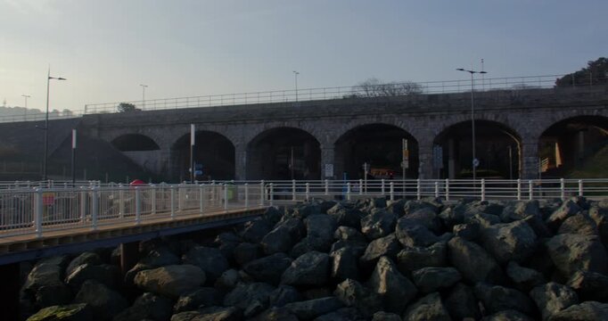Wide panning shot of the The Arches, on the West Promenade, Traeth Hen Golwyn, Old Colwyn Beach
