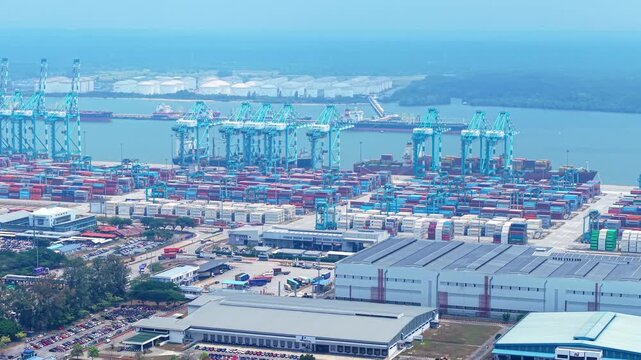Container Port Crane Operation Aerial Drone Pull-Out &mdash; Port of Tanjung Pelepas Johor Malaysia Maritime Logistics 4K