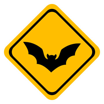 Icono con dibujo sencillo de una se&ntilde;al con forma de diamante de color amarillo, con la silueta de un murci&eacute;lago volando, para tarjetas y felicitaciones de Halloween 
