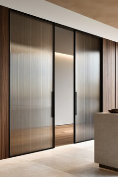 Modern interior with sliding glass doors and minimalist design in warm tones