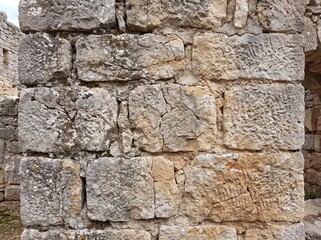 Fototapeta premium Historic ruined stone wall texture with large blocks