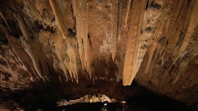 Amazing stalactites hanging from a cave ceiling