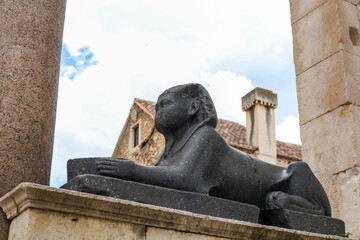 An ancient Egyptian black granite sphinx located in front of the Temple of Jupiter on the peristyle of Diocletian's Palace in Split, Croatia © Alexander