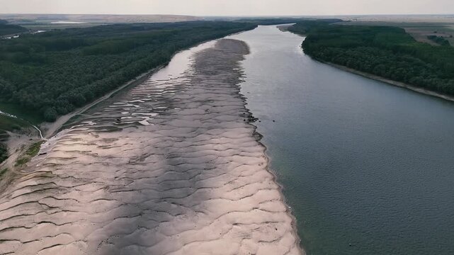 Drone footage with the Danube reaching record low levels during a dry and hot period in the summer of 2026 near Rasova, Romania.