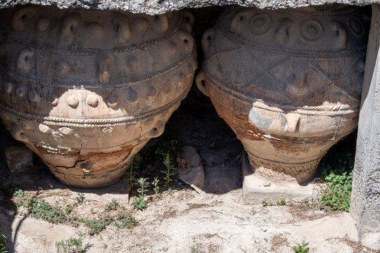 Fragments of ruins and objects at the archaeological site of Phaistos on the island of Crete, Greece