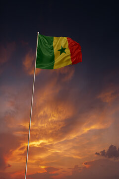 National flag of Senegal in evening sky for holiday card design
