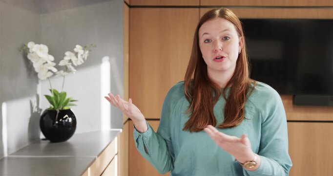 Close up of people talking to the camera, in business, woman gesturing in modern office
