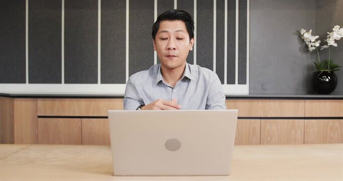 Close up of people talking to the camera, using laptop for video conference, asian male