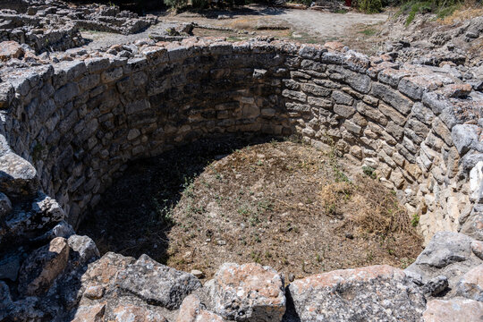 Fragments of ruins and objects at the archaeological site of Phaistos on the island of Crete, Greece