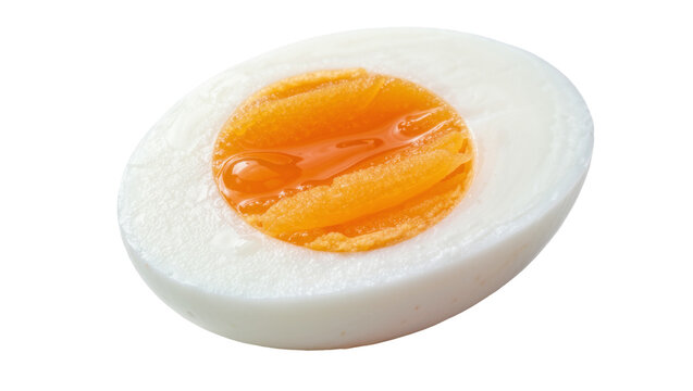 Half of a perfectly cooked hard-boiled egg with bright orange yolk, isolated on transparent background