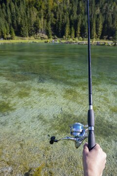 Fishing at a small pond, fishing rod