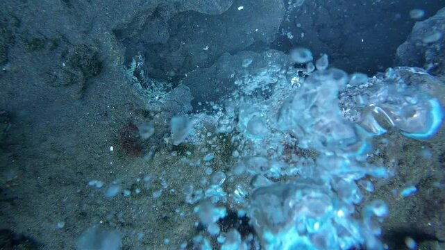 Weh Island, Indonesia : Overhead slow motion footage of bubbles from underwater volcano. also known as hot spring dive site, in Weh Island of Sabang in Aceh, Indonesia