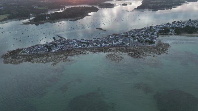Wide aerial view of Ile Tudy peninsula and tidal waters
