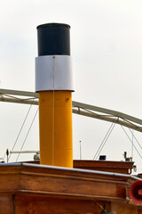 Fototapeta premium Vintage steamer ship chimney and bridge structure in Dordrecht Netherlands industrial maritime heritage and historic river transport vessel detail