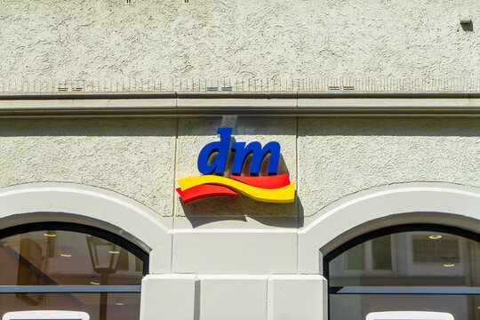 dm drogerie markt store logo on building facade with copy space, Heidelberg