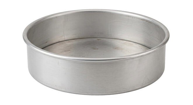 Single empty round silver metal baking pan with a slightly worn surface on a white background