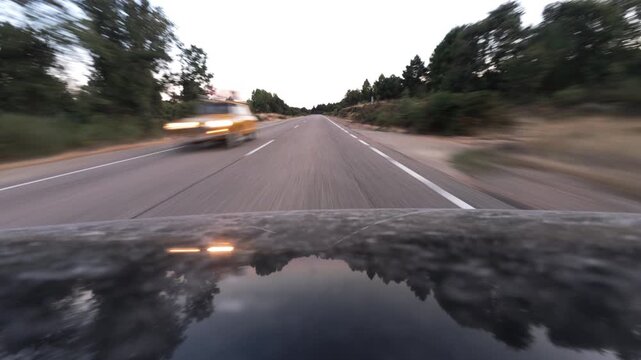 First Person Fast Drive Along Rural Highway at Sunset