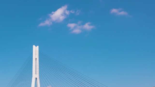 Tatara Bridge Tower Against Blue Sky and Clouds Japan Time lapse