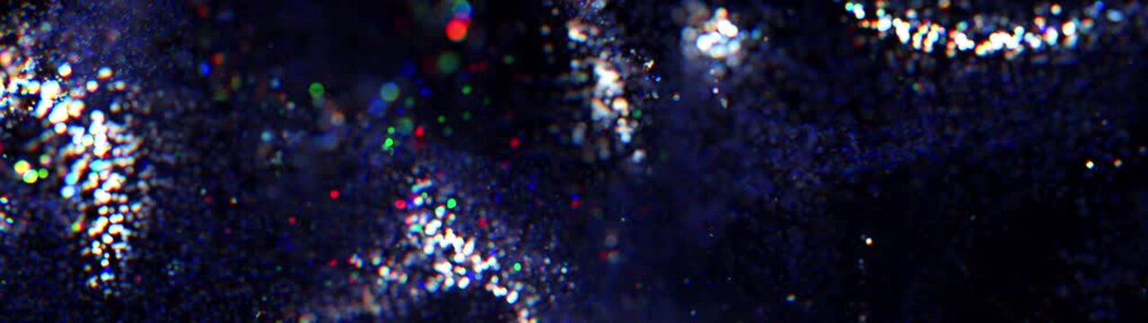 Glamour glitter background. Soft abstract bokeh with rainbow highlights, creating an atmosphere of dreaminess and lightness. Can be used as overlay elements for design projects. 