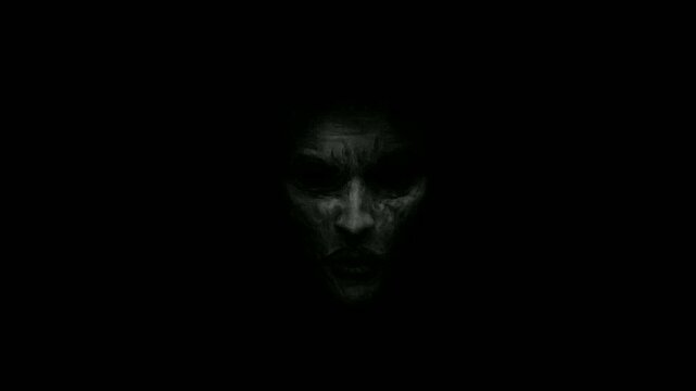 creepy ghost face in darkness, or  haunted scary face creepy darkness, on black background overlay 4k.