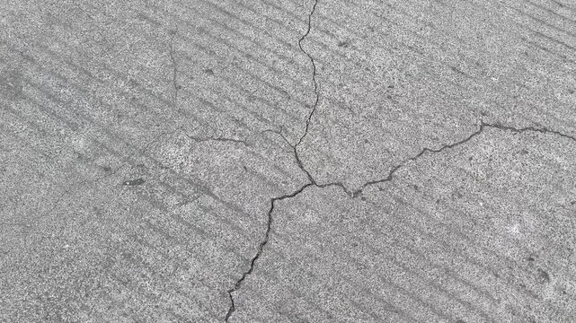 Weathered Rough Concrete Road Texture with Deep Cracks