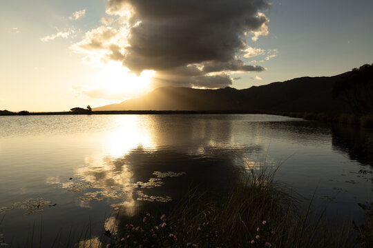 placid pond at sunset, beautiful sunset cloud above, Stanford, South Africa