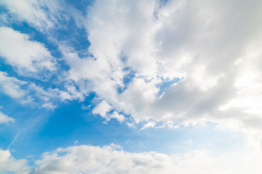 Blue sky with white soft clouds