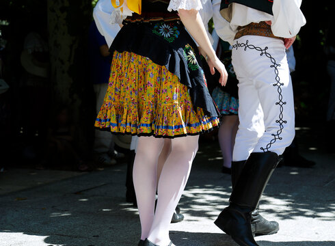 Dancers performing and wearing traditional folk costumes from Slovakia