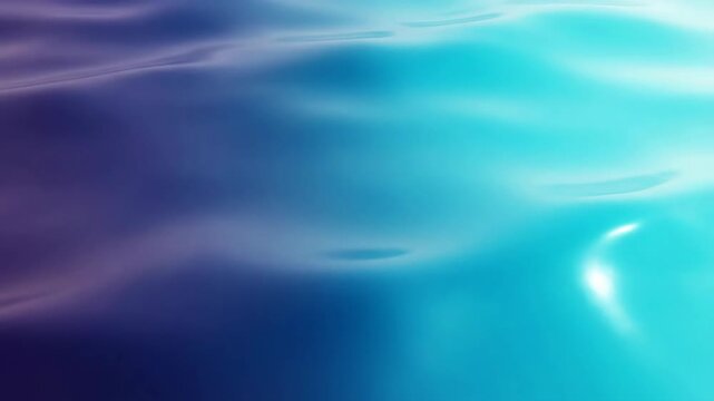 Waves crashing over deep blue ocean waters under cloudy sky with video smooth ocean waves breaking under textured sky atmospheric translucent reflection undulating shimmering